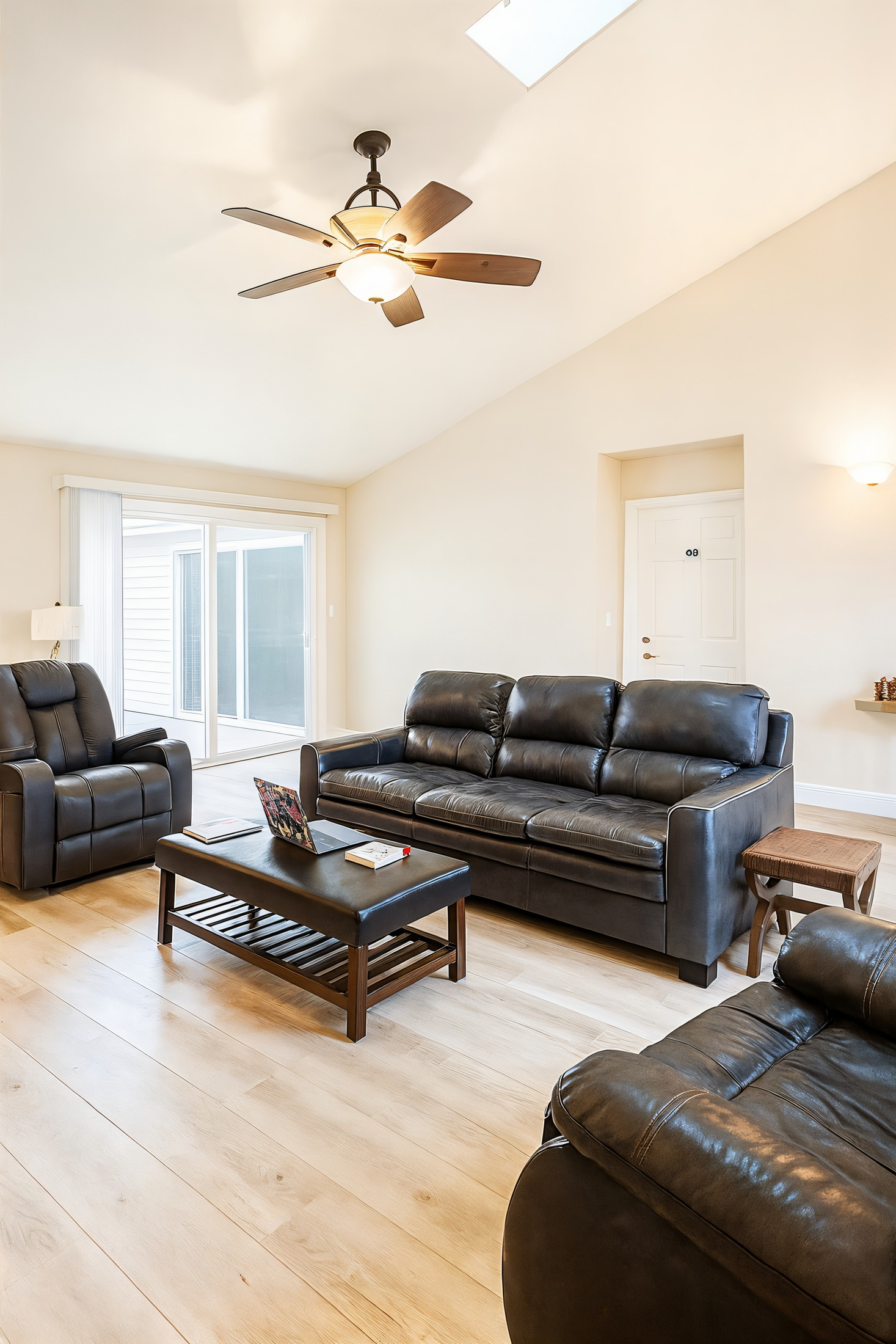 Living room with recliners and television